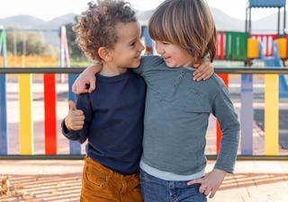 little-boys-outdoors-hugging