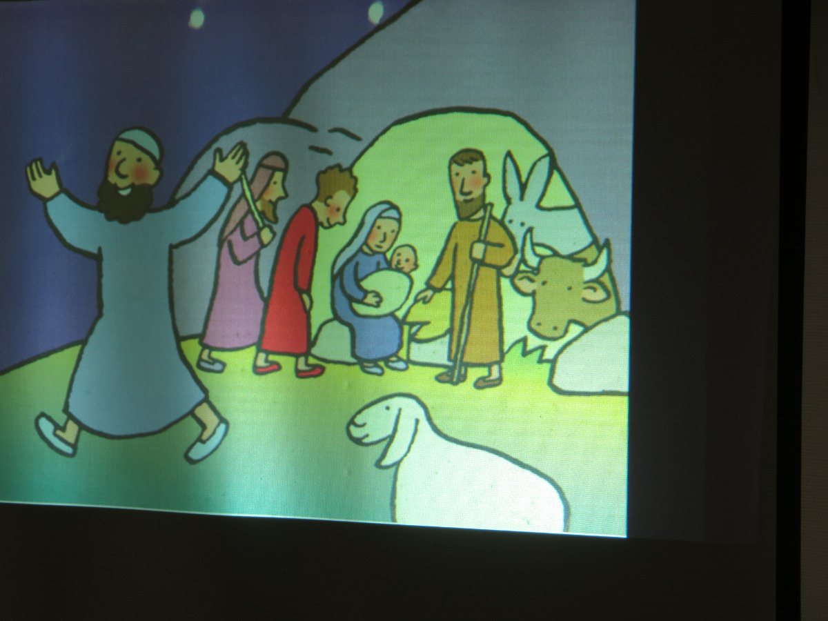 Les bergers avertis en premier courent annoncer la naissance de Jésus.