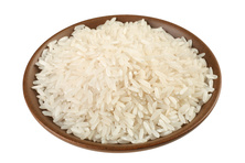 Long white rice on plate isolated on white