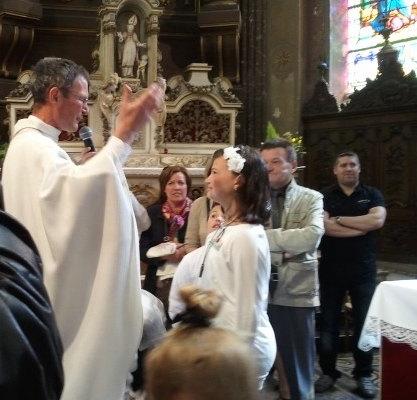 Je te baptise au nom du Père et du Fils et du Saint-Esprit
