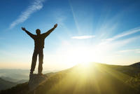 Winner on mountain top. Sport and active life conc
