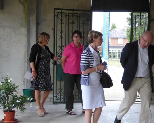 Au retour de la visite des salles