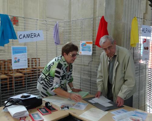 Père Dominique Dewailly et Evelyne Delevallée pour le journal CAMERA