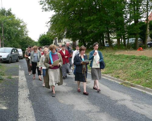 en procession