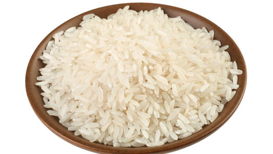 Long white rice on plate isolated on white
